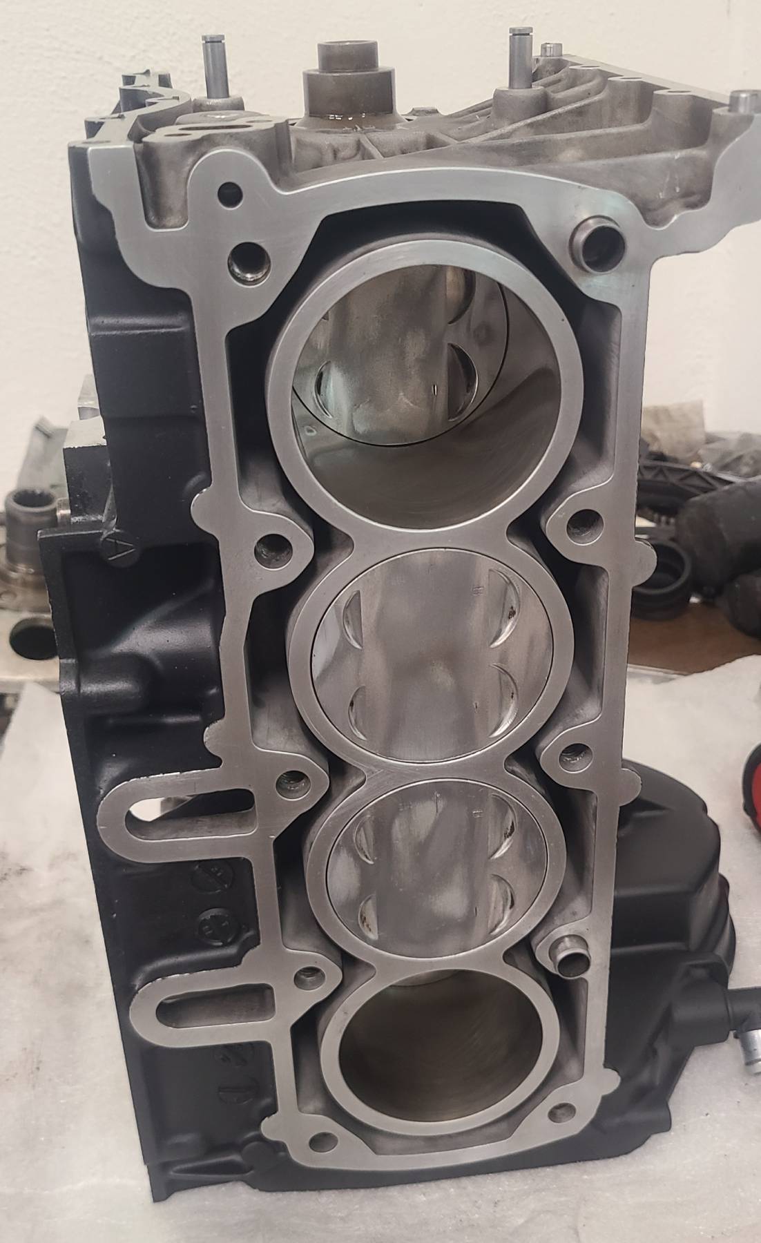 Clean prepared replacement K1100 block showing the cylinder bores and pistons