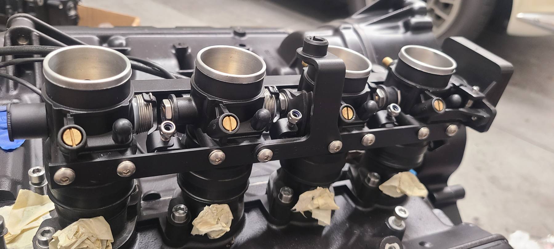 Refreshed black throttle bodies fitted to the rebuilt engine
