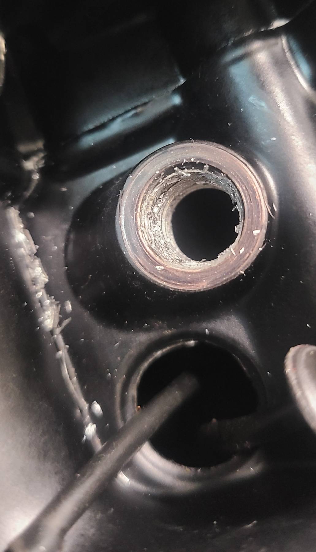 Water pump drain plug threads damaged during the rebuild