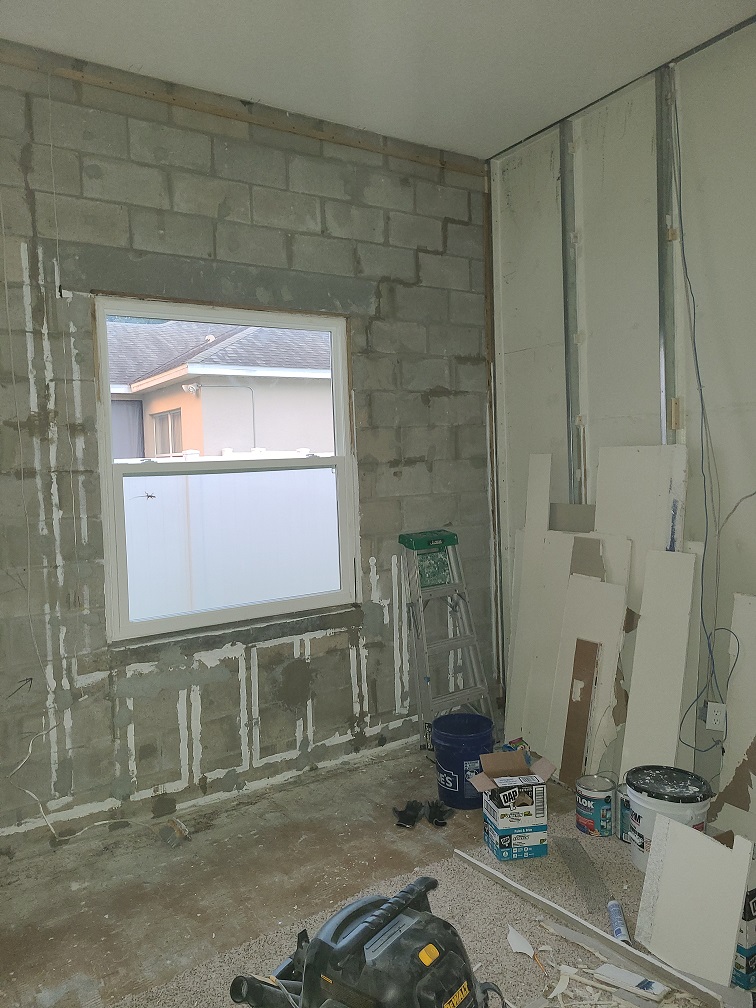 The studio room stripped back during construction